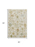 5' X 8' Ivory Gold And Blue Floral Washable Area Rug With UV Protection