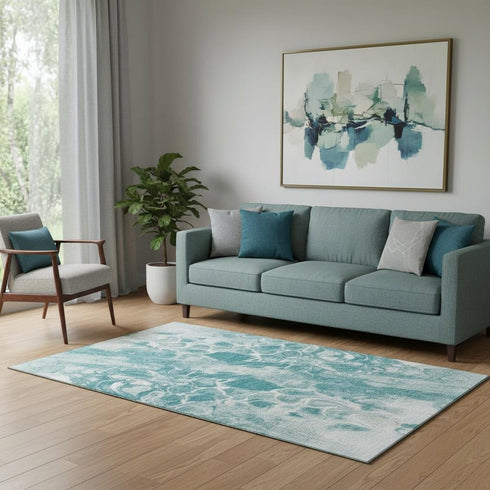 5' X 8' Teal And Ivory Abstract Washable Area Rug With UV Protection