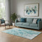 5' X 8' Teal And Ivory Abstract Washable Area Rug With UV Protection