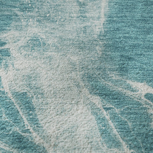 5' X 8' Teal And Ivory Abstract Washable Area Rug With UV Protection