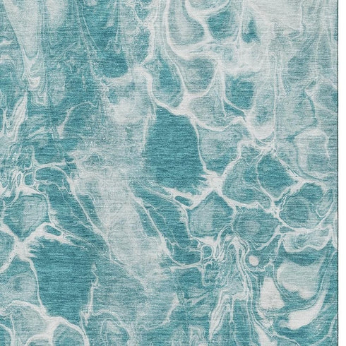 5' X 8' Teal And Ivory Abstract Washable Area Rug With UV Protection