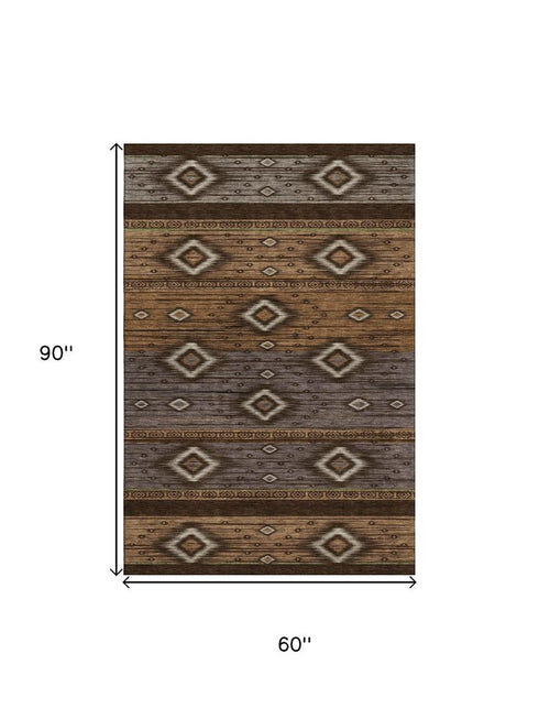 5' X 8' Chocolate And Gray Tribal Washable Area Rug With UV Protection