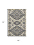 5' X 8' Beige Charcoal And Gray Tribal Washable Area Rug With UV Protection