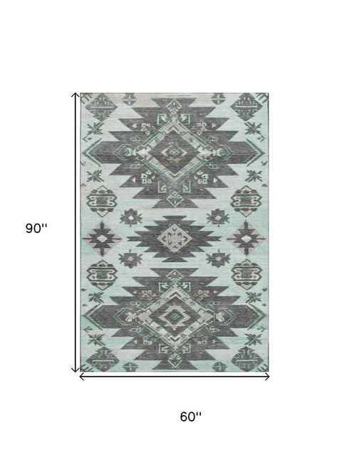 5' X 8' Mint Green Charcoal And Gray Tribal Washable Area Rug With UV Protection