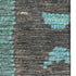 5' X 8' Brown Teal And Ivory Tribal Washable Area Rug With UV Protection