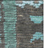 5' X 8' Brown Teal And Ivory Tribal Washable Area Rug With UV Protection