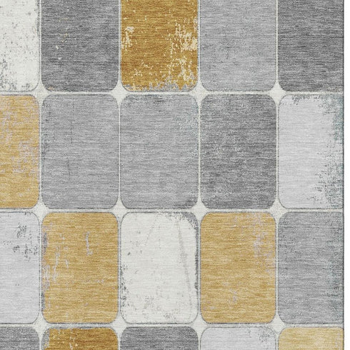 5' X 8' Gold Gray And Ivory Geometric Washable Area Rug With UV Protection