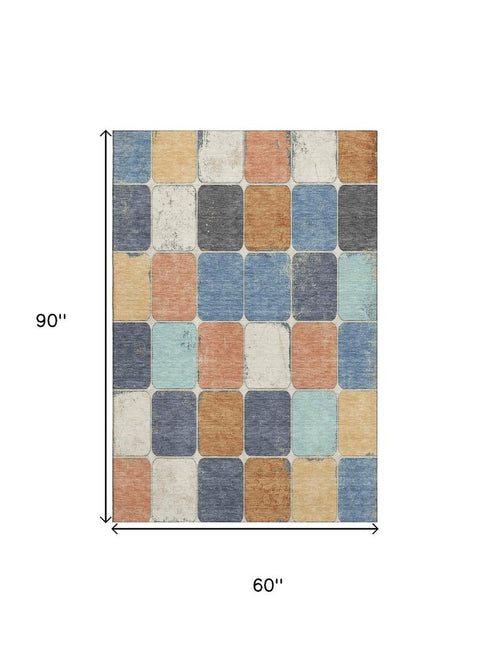 5' X 8' Rust Blue And Ivory Geometric Washable Area Rug With UV Protection
