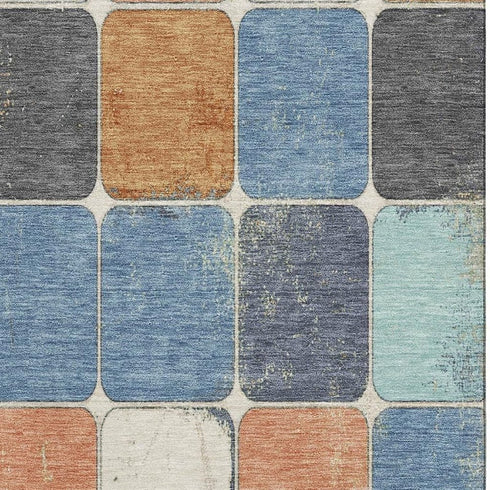 5' X 8' Rust Blue And Ivory Geometric Washable Area Rug With UV Protection