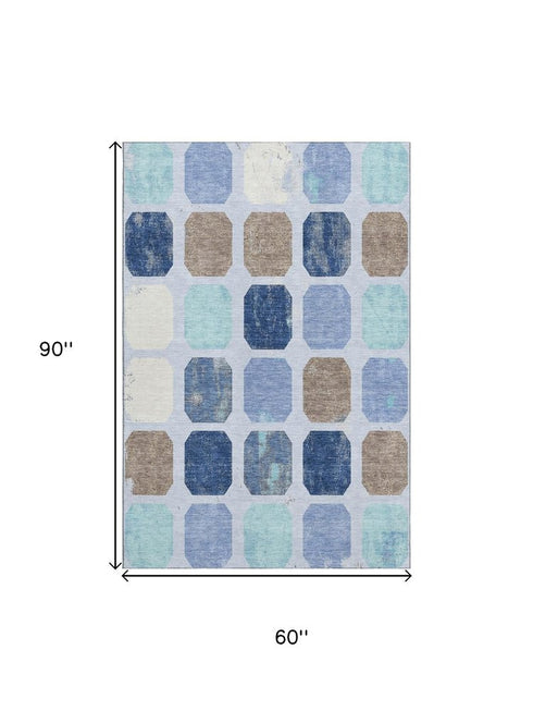 5' X 8' Denim Blue Brown And Teal Geometric Washable Area Rug With UV Protection