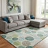 8' X 10' Teal Green And Ivory Geometric Washable Area Rug With UV Protection