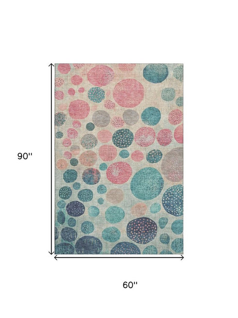 5' X 8' Teal Pink And Beige Geometric Washable Area Rug With UV Protection