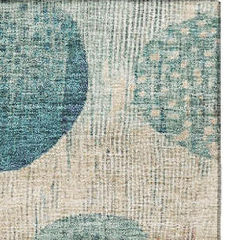 5' X 8' Teal Pink And Beige Geometric Washable Area Rug With UV Protection