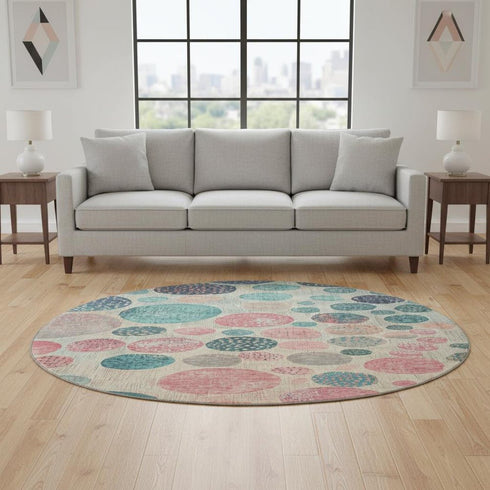 8' Teal Pink And Beige Geometric Washable Round Rug With UV Protection
