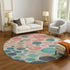 8' Teal Pink And Beige Geometric Washable Round Rug With UV Protection