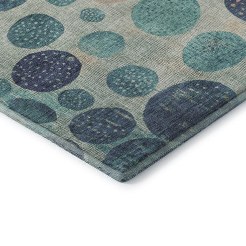 8' Teal Pink And Beige Geometric Washable Round Rug With UV Protection