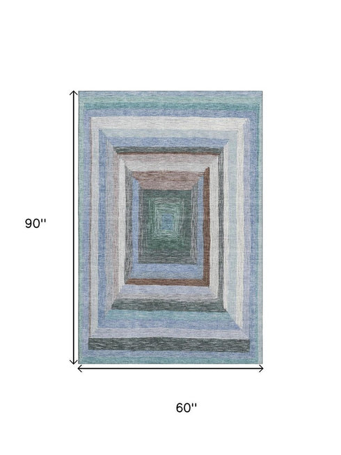 5' X 8' Denim Blue Ivory And Brown Geometric Washable Area Rug With UV Protection