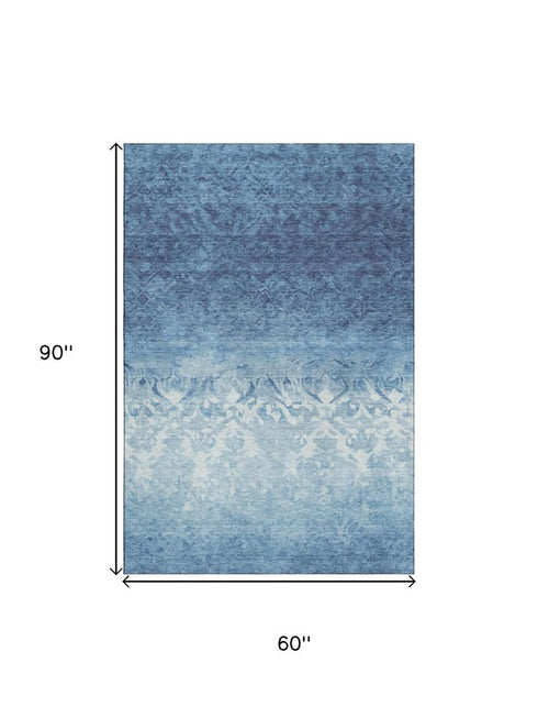 5' X 8' Denim Blue And Ivory Damask Washable Area Rug With UV Protection