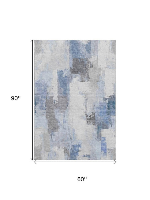 5' X 8' Denim Blue Gray And Ivory Abstract Washable Area Rug With UV Protection