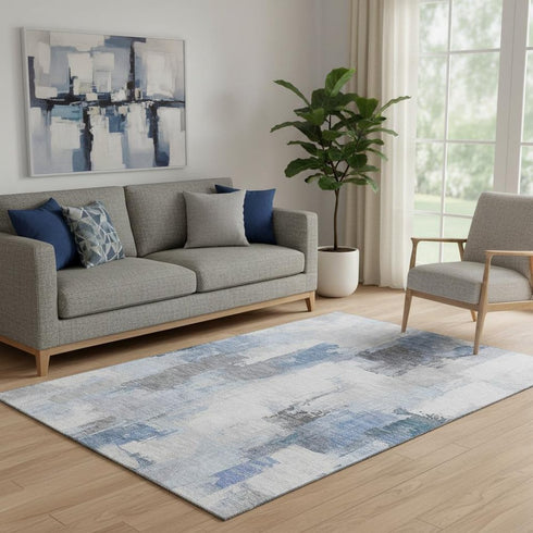 5' X 8' Denim Blue Gray And Ivory Abstract Washable Area Rug With UV Protection