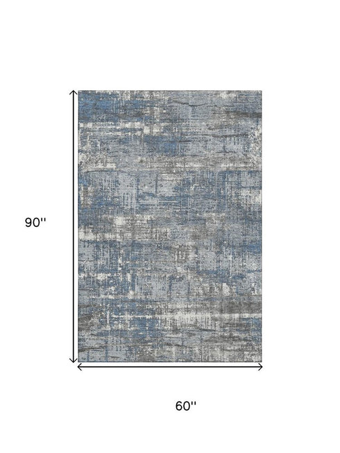 5' X 8' Denim Blue Gray And Ivory Geometric Washable Area Rug With UV Protection