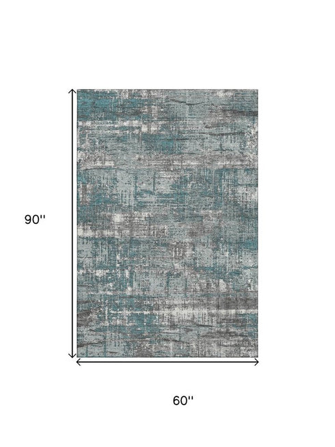5' X 8' Teal Gray And Ivory Geometric Washable Area Rug With UV Protection