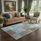 5' X 8' Brown Teal And Ivory Geometric Washable Area Rug With UV Protection