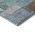 5' X 8' Brown Teal And Ivory Geometric Washable Area Rug With UV Protection