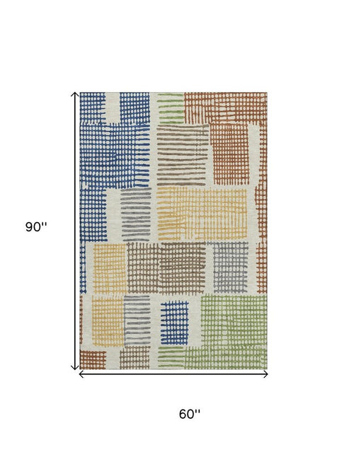 5' X 8' Beige Blue And Green Geometric Washable Area Rug With UV Protection