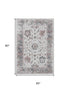 5' X 8' Blush Ivory And Denim Blue Oriental Washable Area Rug With UV Protection