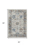 5' X 8' Beige Blue And Brown Oriental Washable Area Rug With UV Protection