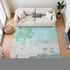 9' X 12' Teal Green And Ivory Abstract Washable Area Rug With UV Protection