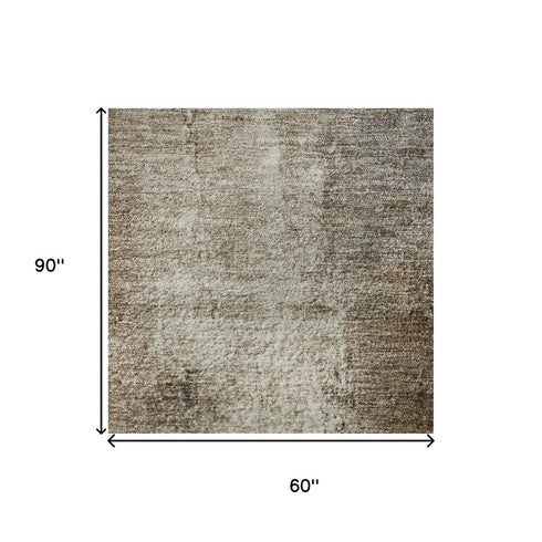 5' X 8' Brown Gray And Ivory Abstract Washable Area Rug With UV Protection