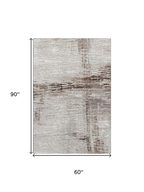 5' X 8' Taupe And Ivory Striped Washable Area Rug With UV Protection