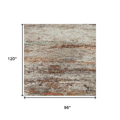 8' X 10' Terra Cotta Beige And Teal Abstract Washable Area Rug With UV Protection