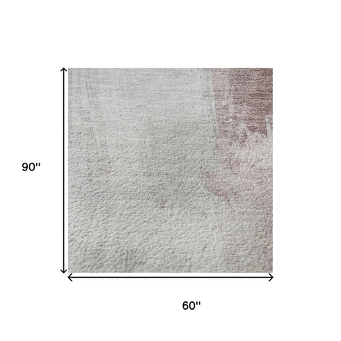 5' X 8' Blush Gray And Ivory Abstract Washable Area Rug With UV Protection