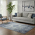 5' X 8' Denim Blue Gray And Ivory Abstract Washable Area Rug With UV Protection
