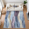9' X 12' Denim Blue Purple And Beige Abstract Washable Area Rug With UV Protection