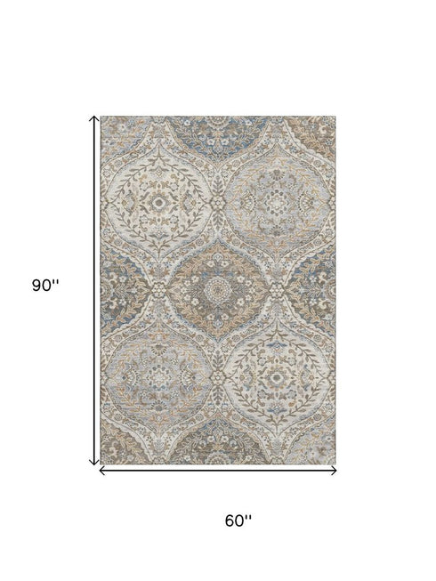 5' X 8' Beige Ivory And Blue Floral Washable Area Rug With UV Protection