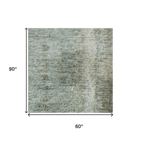 5' X 8' Pale Aqua Beige And Ivory Abstract Washable Area Rug With UV Protection