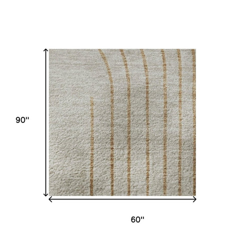 5' X 8' Gold And Beige Geometric Washable Area Rug With UV Protection