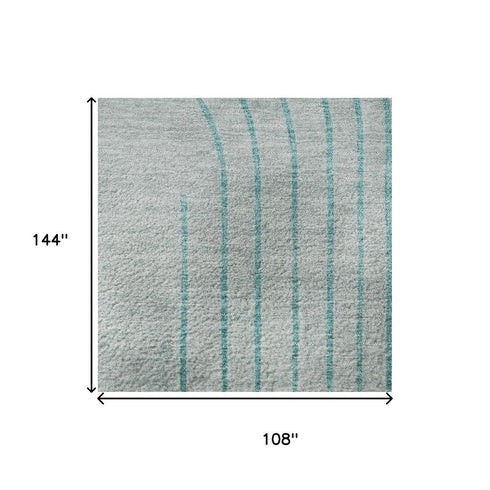 9' X 12' Teal And Beige Geometric Washable Area Rug With UV Protection