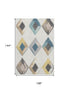 9' X 12' Ivory Blue And Gold Geometric Washable Area Rug With UV Protection
