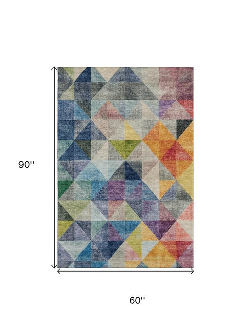 5' X 8' Beige Blue And Orange Geometric Washable Area Rug With UV Protection