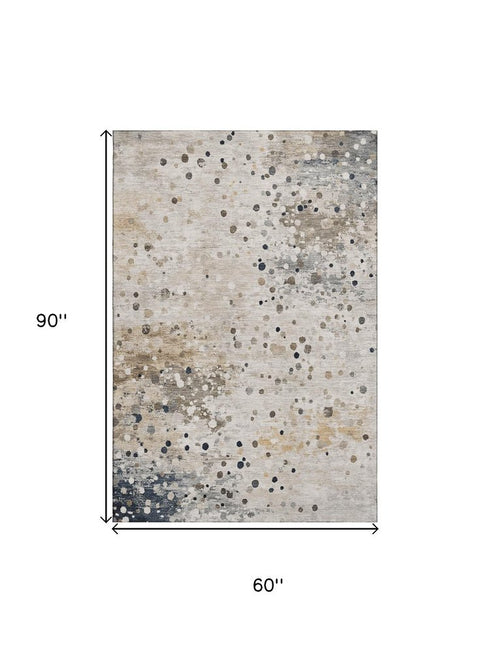 5' X 8' Ivory Gold And Gray Abstract Washable Area Rug With UV Protection