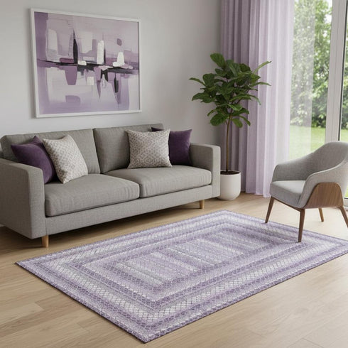 5' X 8' Lavender And Ivory Geometric Washable Area Rug With UV Protection