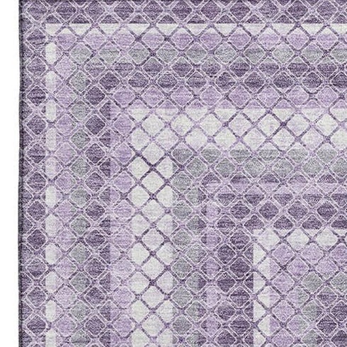 5' X 8' Lavender And Ivory Geometric Washable Area Rug With UV Protection