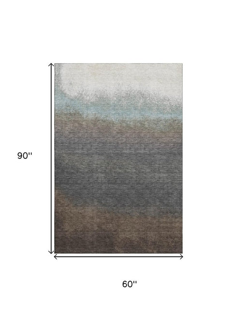 5' X 8' Brown Gray And Silver Ombre Washable Area Rug With UV Protection