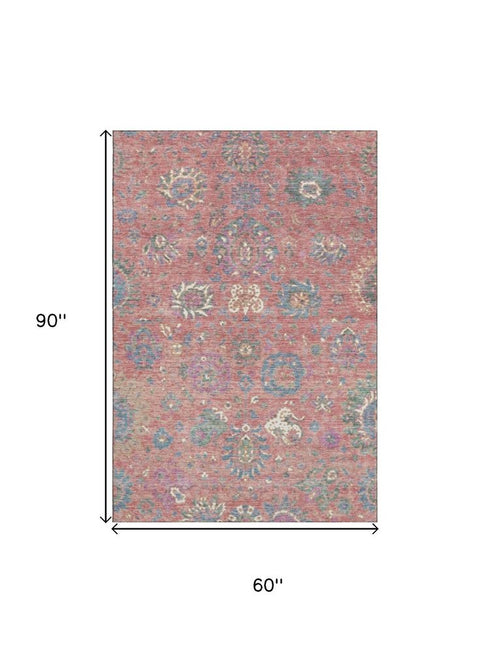 5' X 8' Coral Blue And Ivory Oriental Washable Area Rug With UV Protection