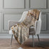 50" X 70" Chocolate And Ivory Abstract Polyester Woven Plush Throw Blanket